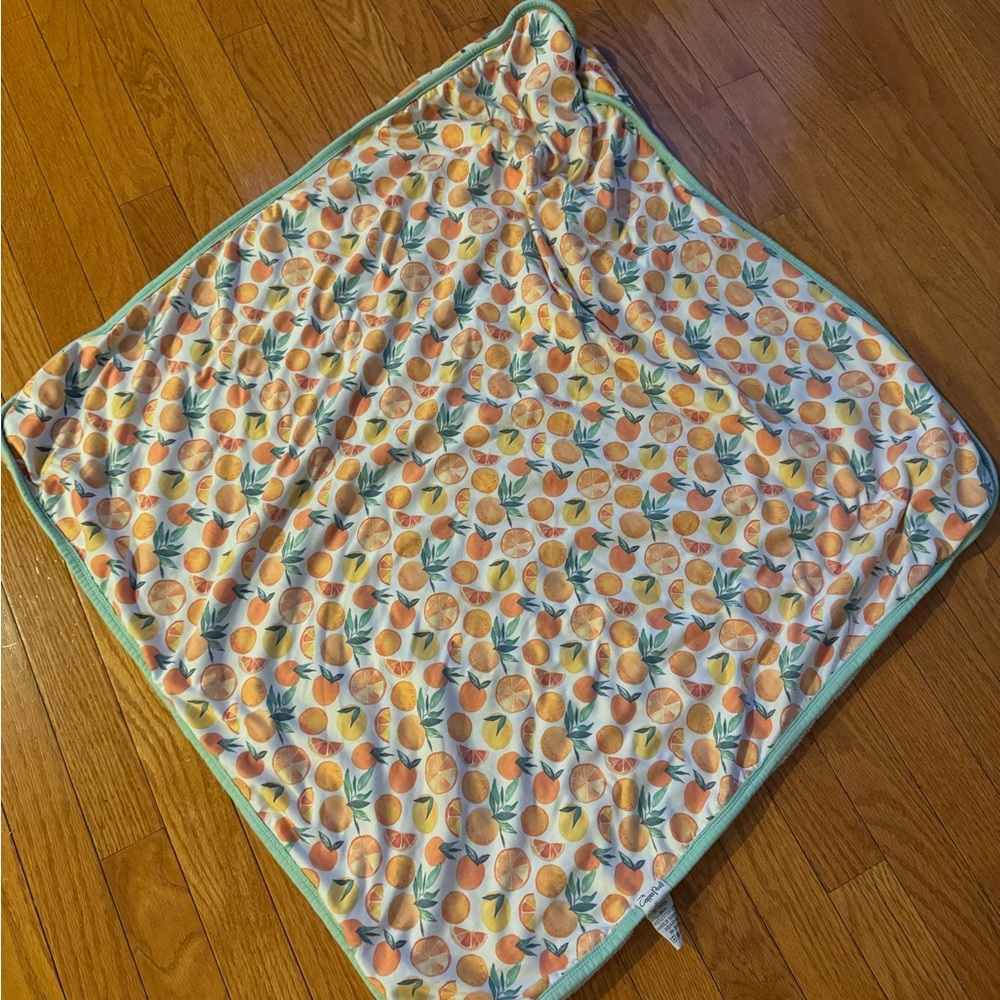 Copper Pearl infant size towel in Clementine pattern